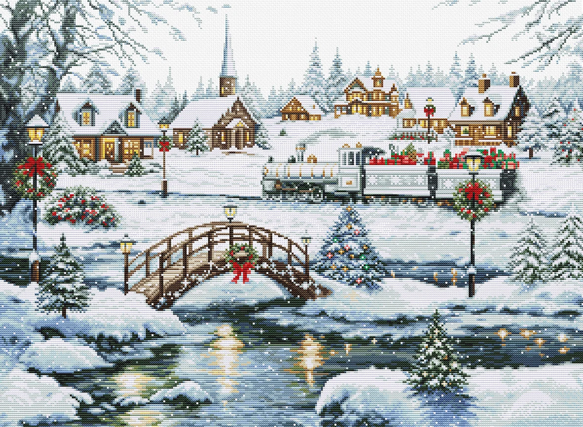 A festive winter village scene with snow-covered houses, a small train, a wooden bridge over a stream, decorated trees, and warm glowing windows, rendered in a needlepoint or cross-stitch style.