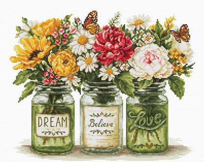 Three mason jars with floral bouquets and motivational phrases on a white background