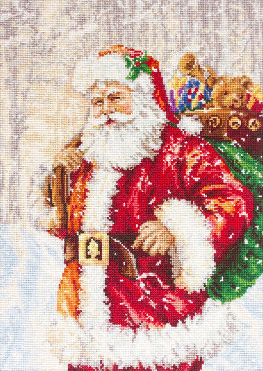 Kit completo da ricamo a mezzo punto Luca-S G575 – Babbo Natale (Santa Claus). Babbo Natale con un grande sacco pieno di regali, su uno sfondo invernale.