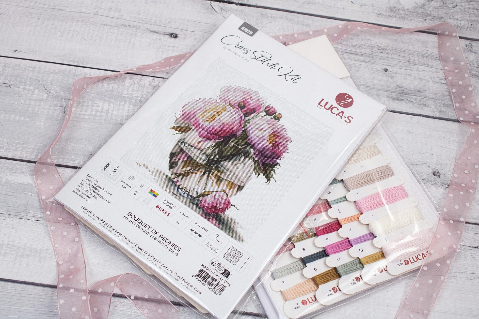 Luca-S B7028 cross stitch kit contents with threads and chart