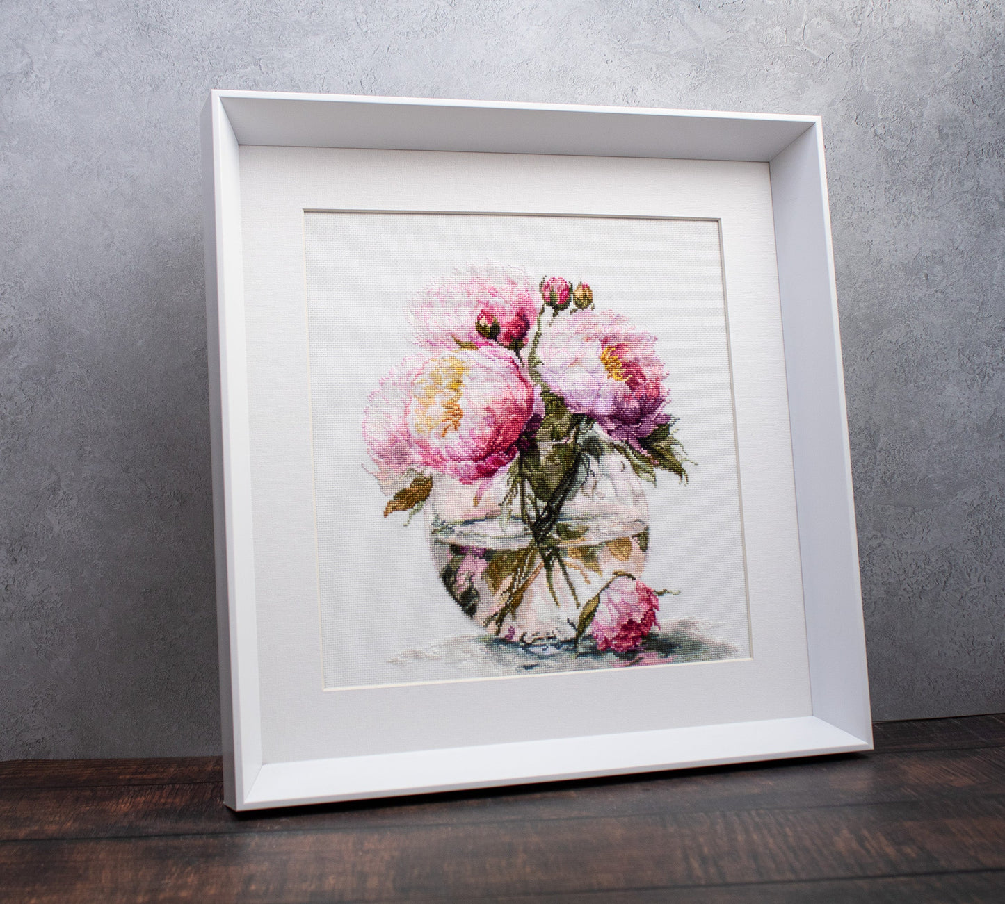 Framed display of Luca-S Bouquet of Peonies B7028 cross stitch artwork