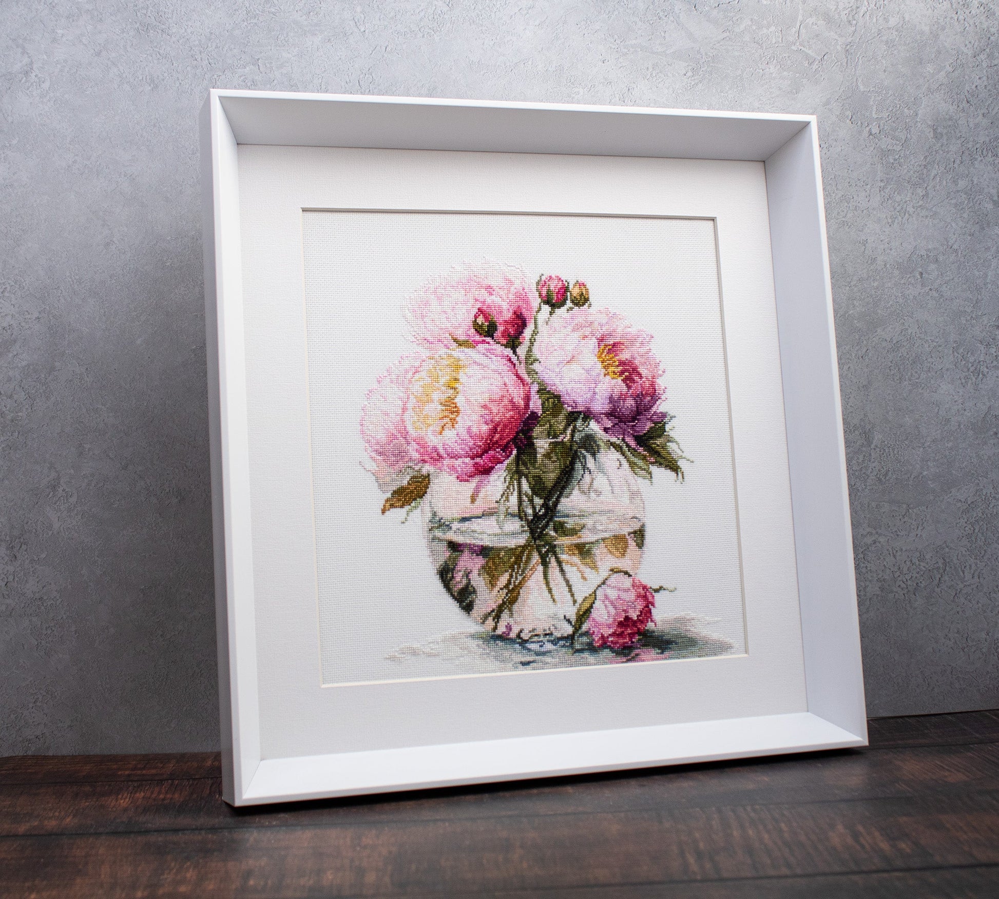 Framed display of Luca-S Bouquet of Peonies B7028 cross stitch artwork